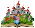 Story book with cartoon princesses and princes in front of a castle Royalty Free Stock Photo