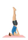 Illustration of a strong man practicing yoga with a shoulderstand pose.