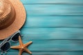 Illustration for summer vacation of a Hat, glasses, and starfish on a blue wooden background, in the style of serene seascapes.