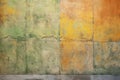 Texture of old rustic wall covered with yellow and green stucco Royalty Free Stock Photo