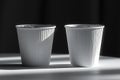 Two flat white paper cups in the air, high quality, high resolution Royalty Free Stock Photo