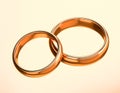 Illustration of two gold wedding rings. Unity and love concepts