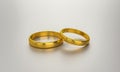 Illustration of two gold wedding rings. Unity and love concepts