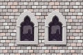 medieval windows on grey color stone wall Royalty Free Stock Photo