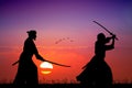 Two Samurai with sword at sunset Royalty Free Stock Photo