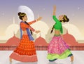 Two women dancing the Bollywood Indian dance Royalty Free Stock Photo