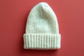White beanie mockup, solid color background, flat lay, front view Royalty Free Stock Photo