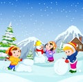 In the winter, kids play in the snow very joyfully