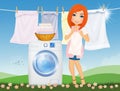 Woman does laundry with washing machine in the outdoor lawn