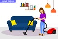 woman with vacuum cleaner. near sofa