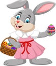 Cartoon Easter bunny girl with a basket of egg Royalty Free Stock Photo