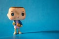 Illustrative editorial of Funko Pop action figure of Eleven with eggos waffles, fictional character from the Netflix series Strang