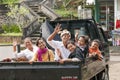 Illustrative editorial image. A joyful family, in a car, goes on holiday to the sea. Bali, Indonesia