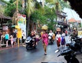 Illustrative Editorial showing traditional Balinese female ceremonial clothing and religious