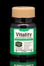 Illustrative editorial Vitality multivitamin mineral pill bottle