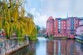 Ilmenau River and old tower in Luneburg, Germany