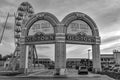 Iluminated entrance arches and colorful big wheel at Kissimmee Old Town in 192 Highway area