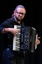 Ilya Shneyveys playing klezmer music on the accordion during a faculty concert at the Klezfest music festival, London UK