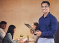 Im all prepped for the meeting. Cropped portrait of a handsome young businessman standing with a clipboard in the Royalty Free Stock Photo