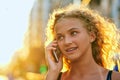 Im in the city. an attractive young woman making a call while walking around the city. Royalty Free Stock Photo