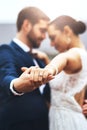 Im dancing into forever with you. a happy newlywed young couple holding hands and dancing together on their wedding day. Royalty Free Stock Photo