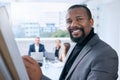 Im excited to share my news plans with my team. Portrait of a mature businessman using a whiteboard during a Royalty Free Stock Photo