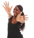 Im feeling full of positive energy. Happy young woman laughing while stretching out her hands. Royalty Free Stock Photo