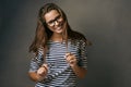 Im happy to be me. Studio shot of an attractive young woman wearing glasses. Royalty Free Stock Photo