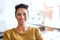 Im here to achieve success. Cropped portrait of a confident and attractive young businesswoman standing in an office. Royalty Free Stock Photo