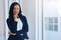 Im here to make my ambitions possible. Portrait of a confident young businesswoman standing in an office.