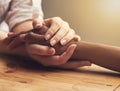 Im always here for you. two unrecognizable people holding hands in comfort. Royalty Free Stock Photo
