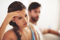 Im just not happy anymore. a young couple having an argument while sitting on their couch at home. Royalty Free Stock Photo