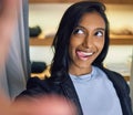 Im just a quirky girl. a young woman making a funny expression while shopping. Royalty Free Stock Photo