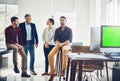 Im leading a high-performing team. Portrait of a young man with his colleagues having a discussion in the background. Royalty Free Stock Photo