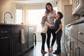 Im so lucky to be your mom. a happy mother playing with her young children in the kitchen at home. Royalty Free Stock Photo