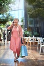 Im at the mall. Full length shot of a senior woman out on a shopping spree. Royalty Free Stock Photo