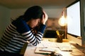 Im so over this day. a young businesswoman looking stressed out while working late in an office. Royalty Free Stock Photo