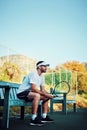 Im so prepared to win today. a sporty young man sitting on a bench on a tennis court. Royalty Free Stock Photo