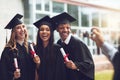 Im tagging everyone in this picture. fellow students taking a picture together on graduation day.