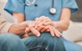 Im thankful for your comfort. Shot of a nurse offering her elderly male patient support. Royalty Free Stock Photo