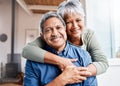 Im your man. a happy senior couple relaxing together at home. Royalty Free Stock Photo