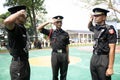 IMA passing out cadets saluting each other.