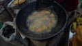 Closeup view of women preparing snacks in Ima market, Imphal, Manipur