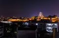 Imabari Castle towers over quiet neighborhood at night