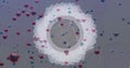 Image of abstract circles rotating amides coronavirus on digital interface