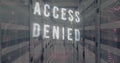 Image of access denied text in circuit board pattern and binary codes over bars on server room Royalty Free Stock Photo