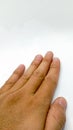 Image of an adult male& hand with well-maintained and neatly trimmed fingernails, captured up close.