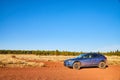 Adventuring with blue Subaru Crosstrek on desert road in Arizona