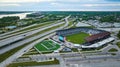 Aerial Lynn Family Stadium soccer field with criss crossing suspended highway roads distant river