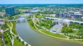 Aerial Scioto Mile Greenway and promenade with winding river leading out of Columbus city